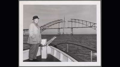 Robert Moses at the placing of final steel, Fire Island Inlet Bridge 1962. After a 1962 storm battered Fire Island, Robert Moses proposed a highway along the New York barrier island; residents fought it and 17 private communities now sit inside a national seashore
