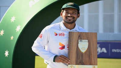 Bangladesh's captain Najmul Hossain Shanto poses for a photo during the presentation ceremony at the end of their second cricket test match against Australia in Mackay, Australia, Sunday, Aug. 23, 2026. (Dave Hunt/AAP Image via AP) 'We showed our character': Bangladesh skipper Najmul Hossain Shanto content despite two-day Test defeat to Australia