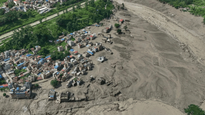 The flood originated in Lhende Khola after an ice-rock avalanche created a temporary blockage upstream Ice-rock avalanche likely triggered Bhotekoshi flood; quake link under probe