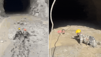 Nepali army rescuers evacuate survivors from a mud-filled tunnel at a hydropower plant in Rasuwa Dramatic rescue in Nepal as survivors crawl through mud from flood-hit tunnel - video