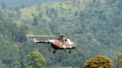 File photo: A helicopter conducts a rescue operation to bought floods affected people to safe places, in Trishuli on Friday. 4 at hydropower tunnel among 108 Indians rescued; toll 682