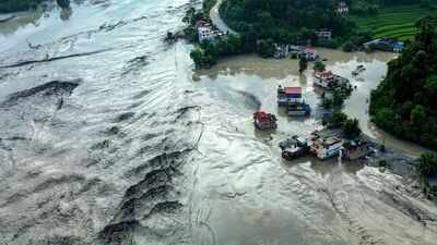 Devastating floods in Nepal (Image Credit: PTI) 7 bodies swept into Gandak river in Maharajganj, Kushinagar districts