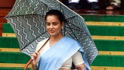 Bharatiya Janata Party MP Kangana Ranaut leaves the Parliament premises after attending the Monsoon Session amid rain, in New Delhi on Thursday. (ANI Photo/Rahul Singh) (Rahul Singh)