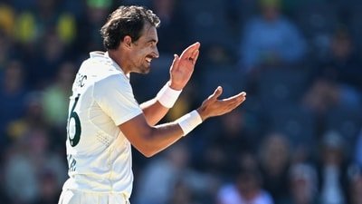 Australia's Mitchell Starc claps his hands while his team plays Bangladesh during the second day of their second cricket test match in Mackay (AP)