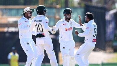 Mehidy Hasan Miraz, right, of Bangladesh is congratulated by teammates. (James Ross/AAP Image via AP) Mehidy Hasan Miraz, right, of Bangladesh is congratulated by teammates. (James Ross/AAP Image via AP)
