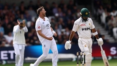 Ollie Robinson celebrates after taking the wicket of Abdullah Shafique. (Action Images via Reuters)