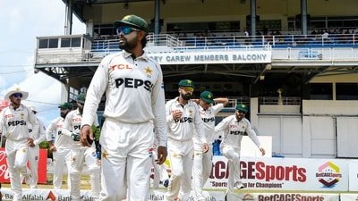 Babar Azam (C) of Pakistan leads his teammates on to the field during the 1st day of the 2nd Test match between West Indies and Pakistan at Queens Park Oval (AFP) Babar Azam (C) of Pakistan leads his teammates on to the field during the 1st day of the 2nd Test match between West Indies and Pakistan at Queens Park Oval (AFP)
