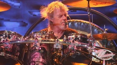 ZZ Top drummer Frank Beard died at 77 after hospice care and health problems, while the band canceled two upcoming shows. (Photo by FRANCOIS NASCIMBENI / AFP) (AFP) ZZ Top drummer Frank Beard died at 77 after hospice care and health problems, while the band canceled two upcoming shows. (Photo by FRANCOIS NASCIMBENI / AFP) (AFP)