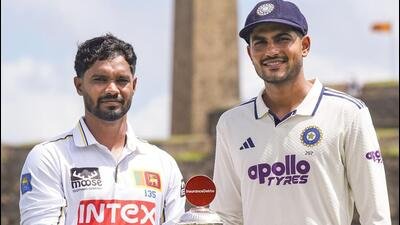 Galle: India's Captain Shubman Gill, right, along with Sri Lanka's Captain Dhananjay de Silva pose for photographs with the series trophy in the backdrop of Galle fort ahead of the first Test cricket match between Sri Lanka and India, in Galle, Sri Lanka, Friday, Aug. 14, 2026. (PTI Photo/Shailendra Bhojak)(PTI08_14_2026_000159A) (PTI)