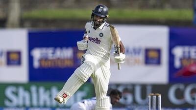 India's Devdutt Padikkal celebrates his century on day one of the first test cricket match between India and Sri Lanka, in Galle. (PTI)
