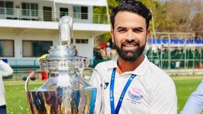 Left-arm spinner Abid Mushtaq posing with the cup after Jammu & Kashmir’s Ranji Trophy victory in February, 2026. (Source pic)
