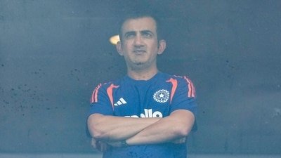 India's coach Gautam Gambhir waits amid a match delay. (PTI) India's coach Gautam Gambhir waits amid a match delay. (PTI)