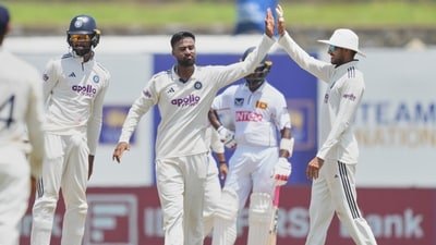 India's Manav Suthar celebrates the dismissal of Sri Lanka's Sonal Dinusha with teammates. (AP Photo/Eranga Jayawardena) India's Manav Suthar celebrates the dismissal of Sri Lanka's Sonal Dinusha with teammates. (AP Photo/Eranga Jayawardena)