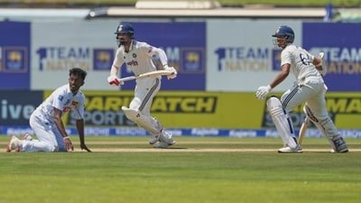 Yashasvi Jaiswal, right, and KL Rahul run towards the same end as Keshara Nuwantha watches during the day one of the first Test match in Galle (AP Photo/Eranga Jayawardena) Yashasvi Jaiswal, right, and KL Rahul run towards the same end as Keshara Nuwantha watches during the day one of the first Test match in Galle (AP Photo/Eranga Jayawardena)