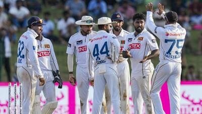 Sri Lanka's Asitha Fernando celebrates with teammates after taking the wicket of Ravindra Jadeja. (PTI)