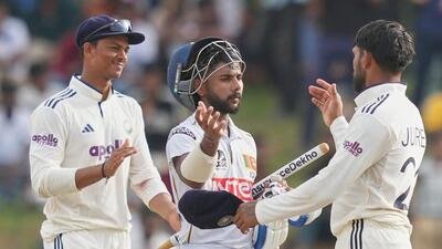 Sri Lanka's Sonal Dinusha is congratulated by the India players after the second Test in Colombo. (AP) Sri Lanka's Sonal Dinusha is congratulated by the India players after the second Test in Colombo. (AP)