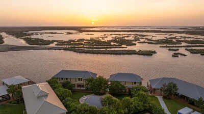 Image Credit: Jon Kohler & Associates via Mansion Global A Louisiana businessman built a house on floating barges so it could be towed into open water for duck season; the 22-person property is now asking $5.5 million
