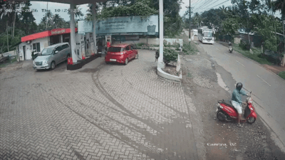 A tourist bus carrying wedding guests overturned near a petrol pump in Kakkoor Video-worthy escape: Kerala bus overturns at petrol pump after driver swerves to avoid two-wheeler, 20 injured
