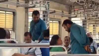 A viral video shows a man abusing and threatening a woman on a Mumbai local train. Man yells at woman for sleeping on seat, whips out belt to hit her in Mumbai local