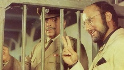 Anupam Kher and late Dilip Kumar in Karma. Anupam Kher and late Dilip Kumar in Karma.