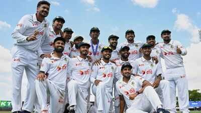 Bangladesh players pose for a team photo as they celebrate after defeating Australia on day four of the first cricket test in Darwin, Australia, Sunday, Aug. 16, 2026. (James Ross/AAP Image via AP) How Bangladesh followed Virat Kohli's template to humble Australia in Darwin