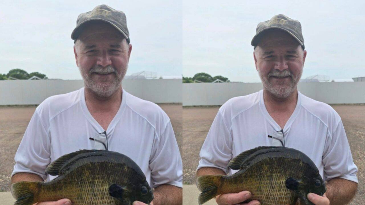 Dale Hoffman with fish<br>