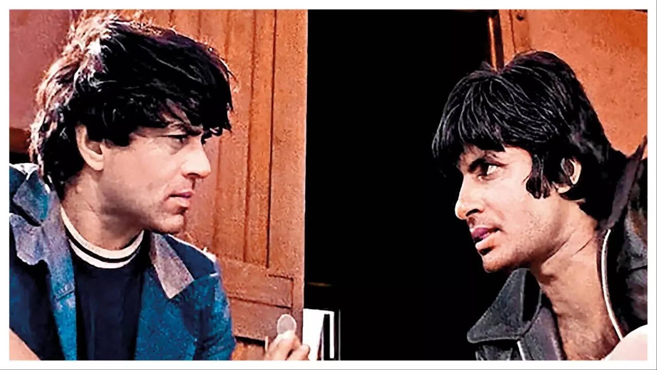 Dharmendra and Amitabh Bachchan in the iconic coin-toss scene from Sholay