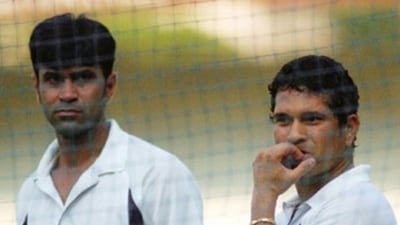 Dheeraj Jhadav with Sachin Tendulkar. (X Images)