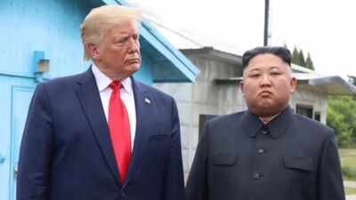 Donald Trump shared this image of him and Kim Jong Un 'Unfriendly look, but we get along great': Trump posts old photo with Kim Jong Un