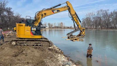 Excavator installing a fish lunker on Ford Cove. Credit: Ford House Michigan's historic Ford House is replacing concrete shoreline with natural habitat; the $7 million project will restore 1 mile of shore and 17.5 acres of aquatic and wetland habitat