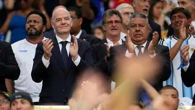 FIFA president Gianni Infantino, left, and Argentine Football Association president Claudio Tapia clap before the World Cup round of 32 match between Argentina and Cape Verde, Friday, July 3, 2026. (AP Photo) Football world splits as Argentina, Mexico back FIFA president Infantino amid World Cup rights row