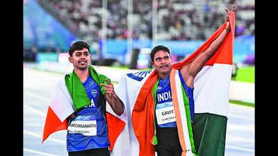 Dilip Mahadu Gavit and Mohammed Basil Morssinganakathi. (PTI Photo) CWG para champions complain against IOA staff, seek action over alleged 'misconduct, disrespectful behaviour'