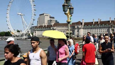 File photo: People cross Westminster Bridge during a heatwave (Picture credit: Reuters) UK searches for homes with air conditioning jump 104% as heatwaves intensify
