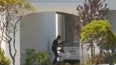 This still image captured from video by a witness shows the scene of a shooting that started at an In-N-Out Burger restaurant US: 3 killed in Idaho shopping area shooting; gunman among dead