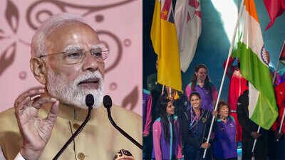 PM Narender Modi; and boxer Jaismine Lamboria with India's national flag during the CWG closing ceremony. (PTI Photo) 'Displayed exceptional skill, determination and dedication': PM Modi hails India's Glasgow CWG heroes