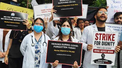 File photo: MBBS interns of Government Medical College (GMC) Jammu and its associated hospital hold a poster during their protest demanding a hike in their monthly stipend. MBBS, BDS interns in J&K start indefinite strike over ‘low’ stipend