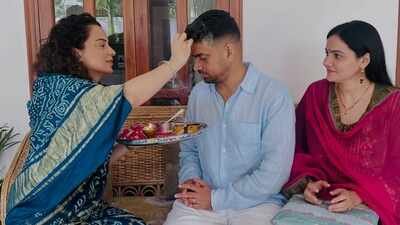 Kangana Ranaut celebrates Raksha Bandhan in a saree with teeka, aarti thali and traditional rituals after criticising Kriti Sanon’s ad and her outfit: PICS