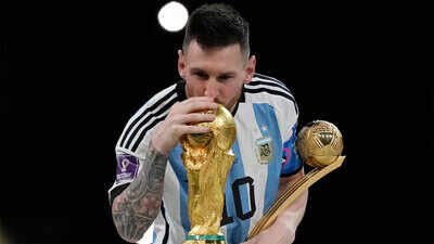File Pic - Argentina's Lionel Messi kisses the trophy after winning the World Cup in 2022. (AP/PTI Photo) Lionel Messi’s 10 most iconic moments as Argentina legend retires from international football