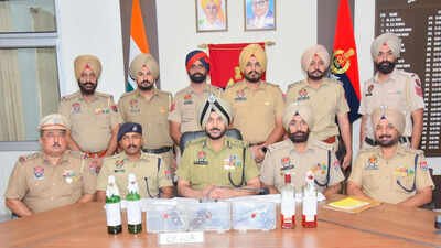 Police commissioner Gurpreet Singh Bhullar addresses mediapersons Pistols, petrol bombs seized as Punjab Police busts 2 ISI-backed terror modules, 9 held