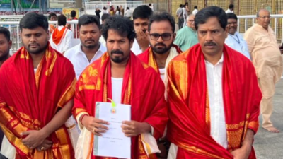 Tamil Nadu agriculture minister R Vinoth at the Tirumala Venkateswara Temple on Saturday Controversy erupts after TVK minister offers prayers at Tirumala temple holding agriculture budget document