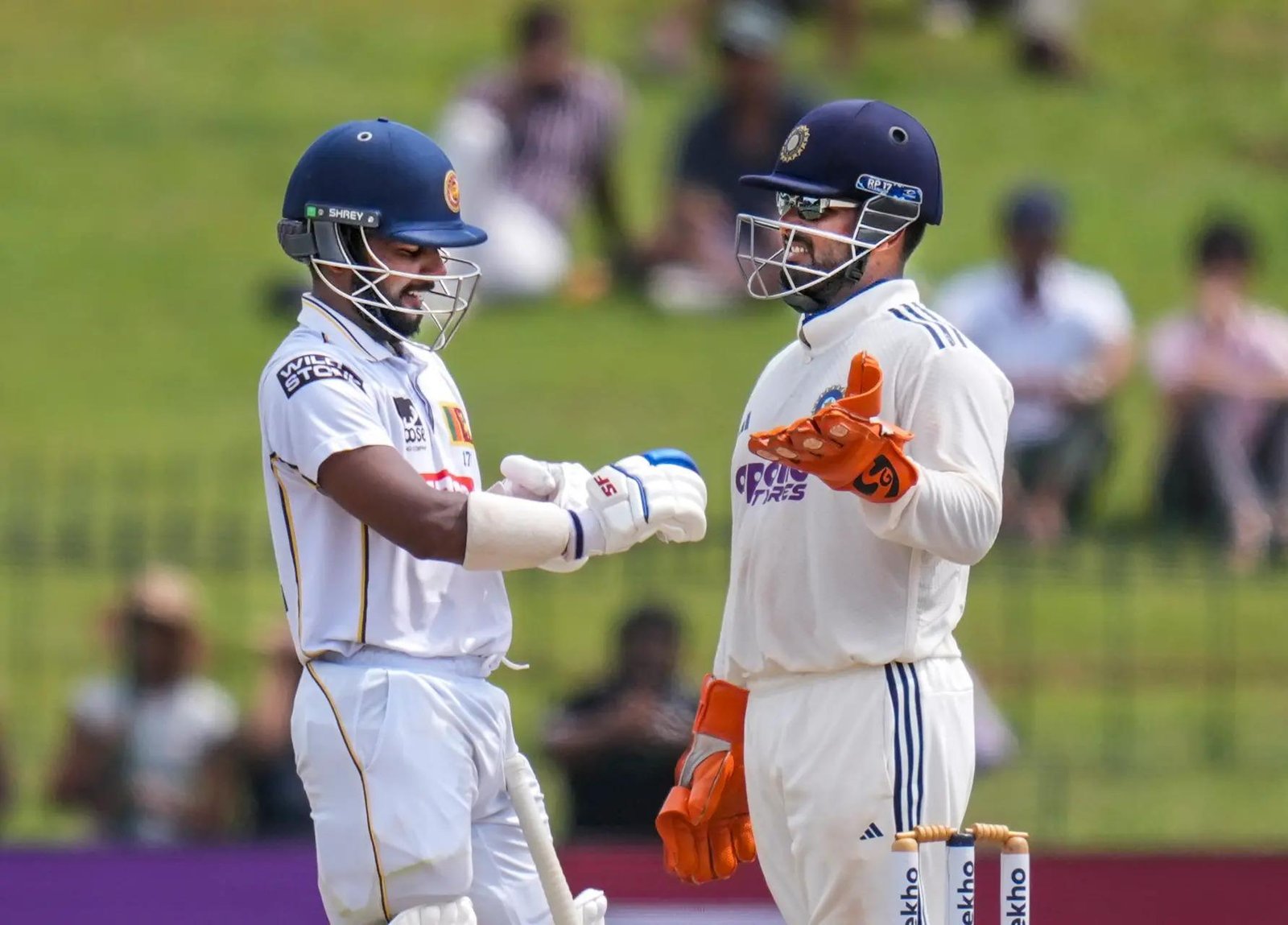 Rishabh Pant, right, with Sri Lanka's Sonal Dinusha on day five of the second Test cricket match between India and Sri Lanka, in Colombo, Sri Lanka. (PTI)