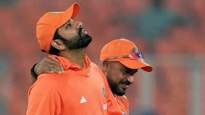 Rohit Sharma with T Dilip during a practice session ahead of the ICC Men's Cricket World Cup 2023 final match between India and Australia, at the Narendra Modi Stadium, in Ahmedabad. (PTI Photo) 'You created magic': Rohit Sharma hails T Dilip as India replace fielding coach