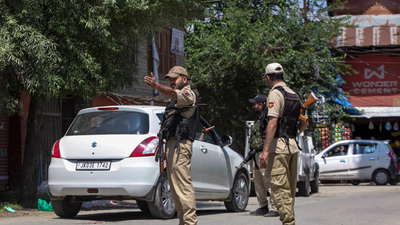 Kulgam: Security personnel keep a vigil during an inspection of vehicles to maintain public safety following the recent terror attack in Anantnag, at Qaimoh, Kulgam district, Jammu and Kashmir. J&K: Days after Kulgam terror attack, man with grenade held in Pulwama