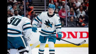 FILE - San Jose Sharks center Macklin Celebrini, right, talks with goaltender Yaroslav Askarov during the third period of an NHL hockey game against the Anaheim Ducks, April 9, 2026, in Anaheim, Calif. (AP Photo/Ryan Sun, File) Is Macklin Celebrini ready to captain the San Jose Sharks and follow NHL stars Connor McDavid and Sidney Crosby