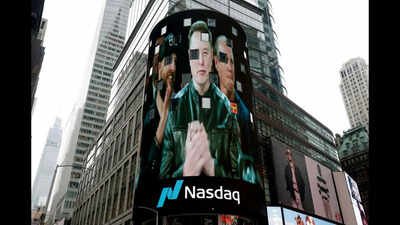 Elon Musk's billboard pictured on the day of SpaceX's initial public offering (IPO) Elon Musk net worth 2026: World’s richest person added over $800 million per day