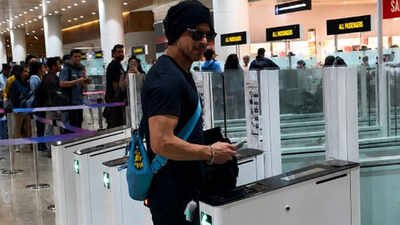 Shah Rukh Khan SPOTTED at London airport; sparks frenzy at immigration counter - WATCH