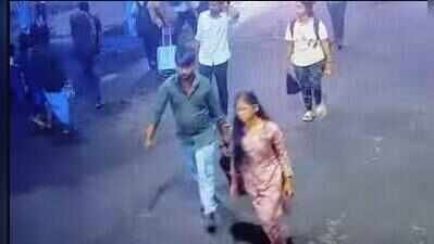 A video grab of the couple carrying the suitcase to Chennai Central railway station Odisha woman’s remains found in trolley aboard TN Express, Chennai cops launch search in state