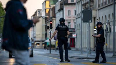File Photo: Police officers patrol a street in downtown Aarau, Switzerland Sunday, Aug. 30, 2026, following a shooting at a rave. Manhunt underway in Switzerland after rave shooting; police say terrorism possible motive