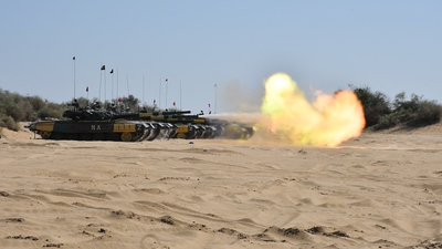 T-72 tanks of the Indian Army firing during an exercise in the western sector. These tanks are now in the positive indigenisation list. (Image credit: Indian Army) From Su-30MKI to T-90: India adds 405 defence items to ‘make at home’ list