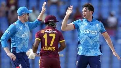 England's John Turner, right, celebrates with teammate Dan Mousley taking the wicket of West Indies' Evin Lewis (PTI file photo) England fast bowler John Turner retires from cricket at 25